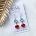 O’Lolly “Reba” Earrings - Red and Blue Dangles